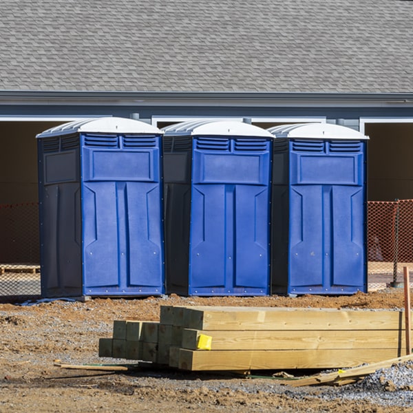 what is the cost difference between standard and deluxe portable restroom rentals in Abernathy